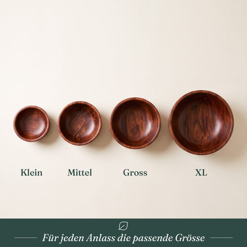Vier Holzschalen aus Jujube-Holz in aufsteigender Grösse von Klein bis XL, von oben fotografiert